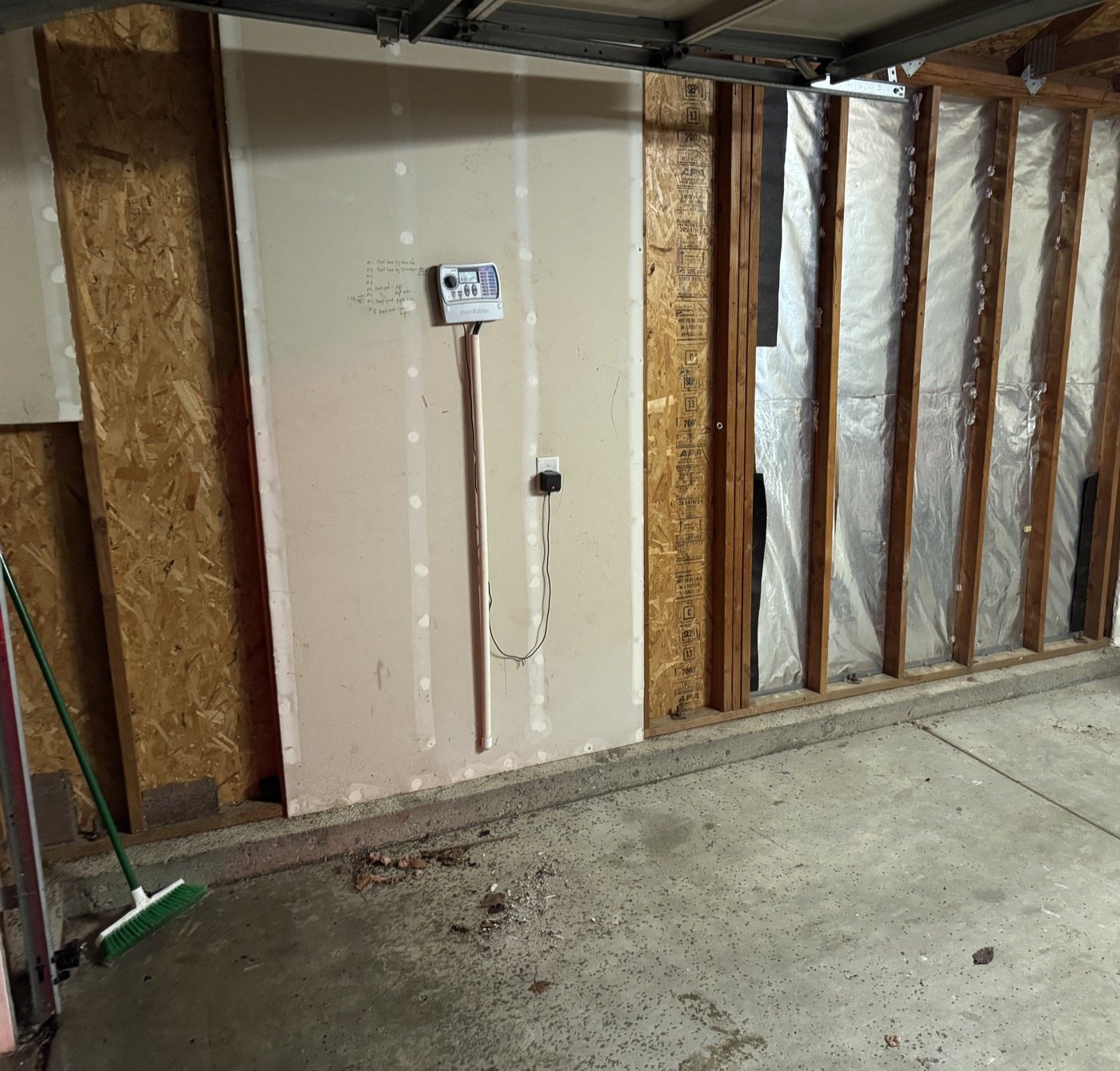 After: garage completely cleared of all construction waste
